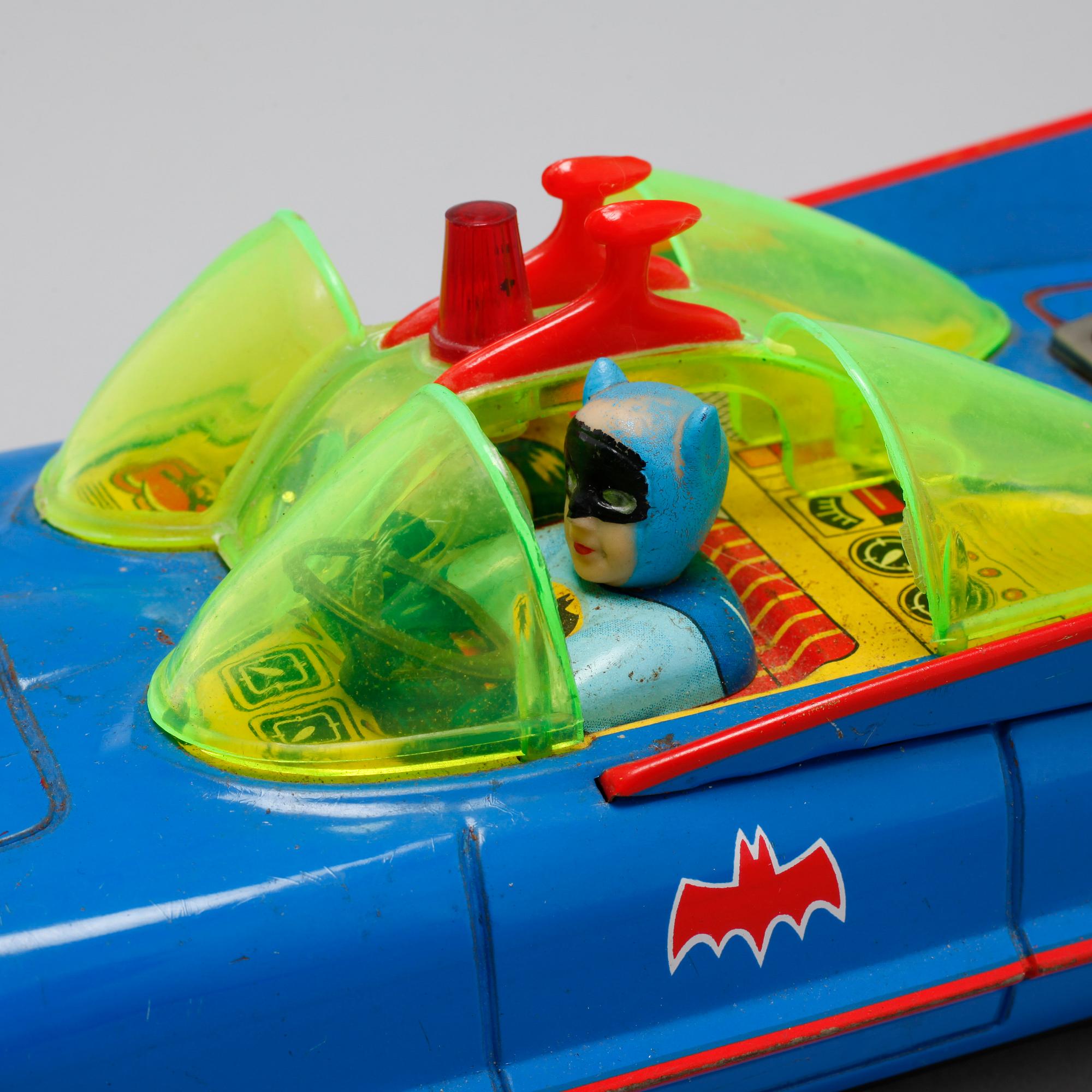 Seven Batman objects from the latter half of the 20th century.