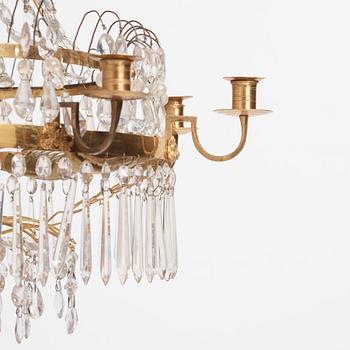 A Gustavian gilt brass and cut glass nine-branch chandelier, Stockholm late 18th century.