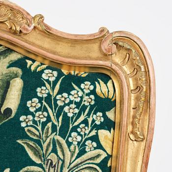 A pair of Louis XV-style giltwood fauteuils, late 19th century.