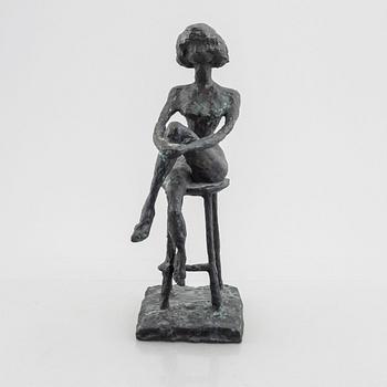 Inga Bagge, A seated woman.