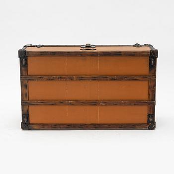 Louis Vuitton, orange Steem Trunk from the early 20th century.