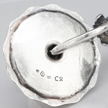 A pair of Swedish 18 century silver candelabras, mark of Lars Åkerblom Gävle 1775, arms by Christian Kullberg.