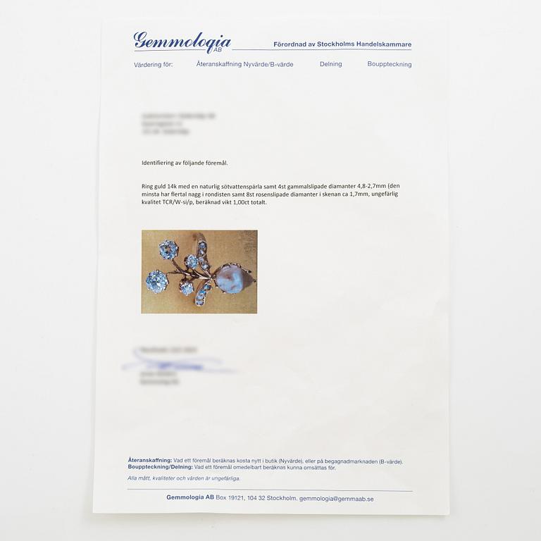 Ring 14K gold flower-shaped with a freshwater pearl and old-cut and rose-cut diamonds.