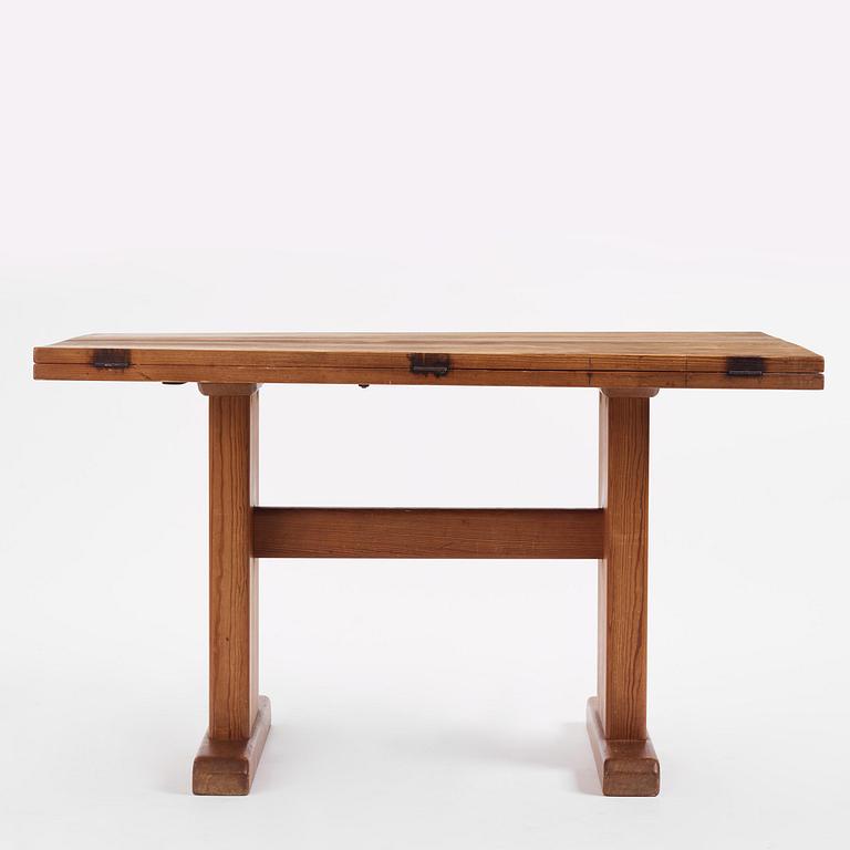 Carl Malmsten, a stained pine table, Sweden, 1930s.