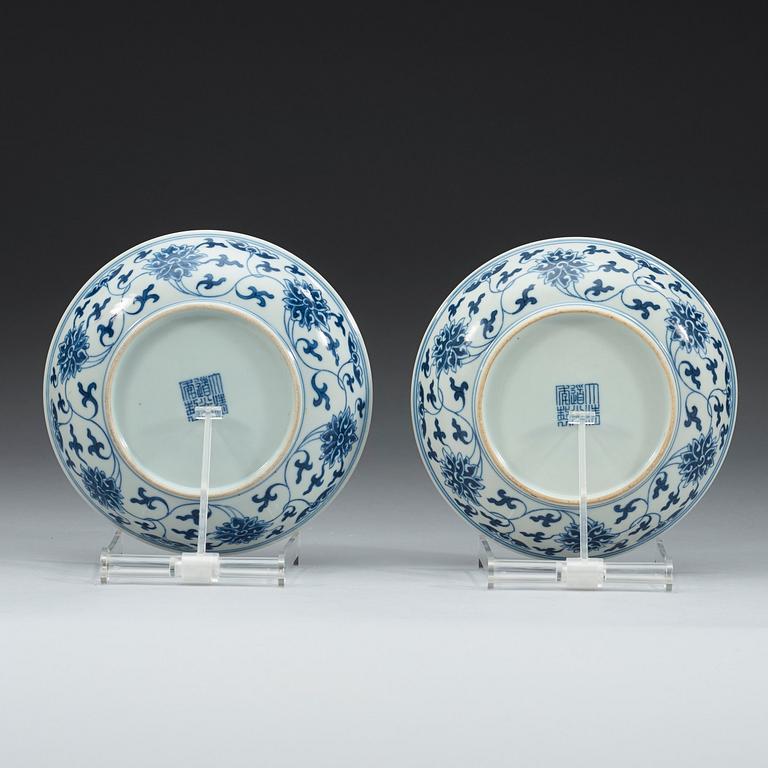 A pair of blue and white lotus dishes, Qing dynasty, 19th Century with Daoguangs seal mark and period.