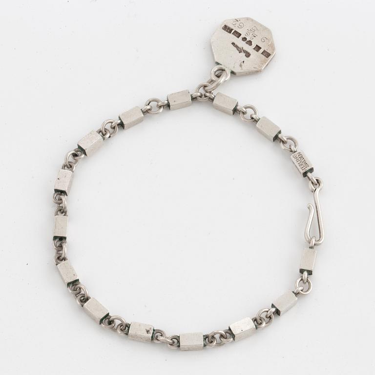 WIWEN NILSSON, silver bracelet with charm.