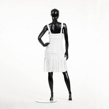 CHANEL, a white bouclé dress, 2004.
