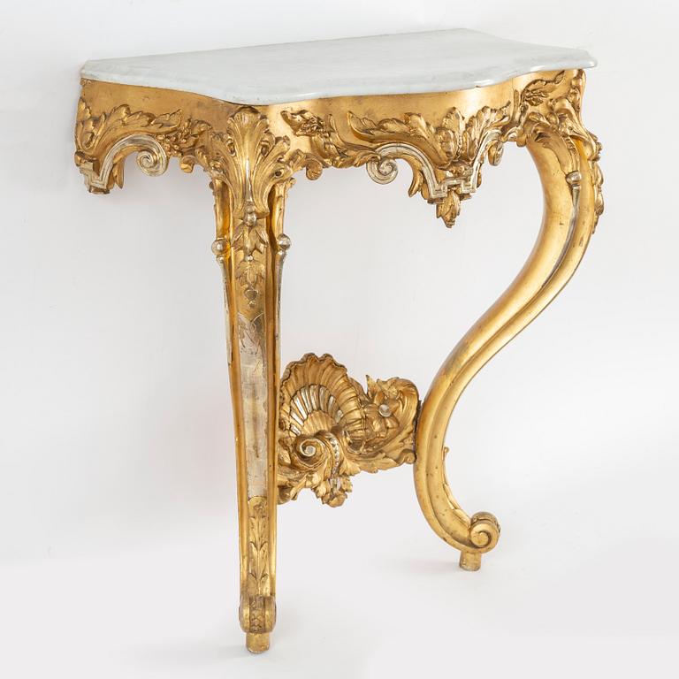 A late 19th century mirror and console table.