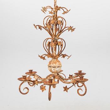A metal ceiling pendant around 1900.
