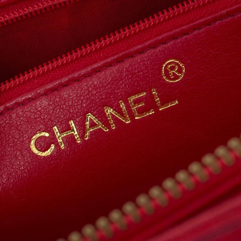 Handbag by Chanel.