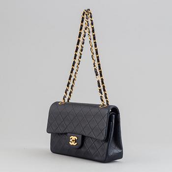 Chanel, a navy leather 'Double Flap Bag', 1989-91.