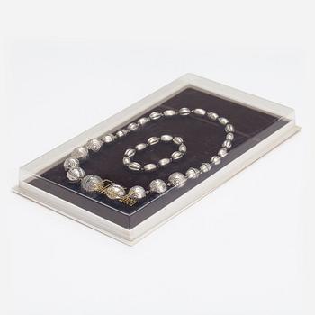 A set of sterling silver necklace and bracelet "Halikko treasure". Kalevala Koru, Helsinki 1967-72.