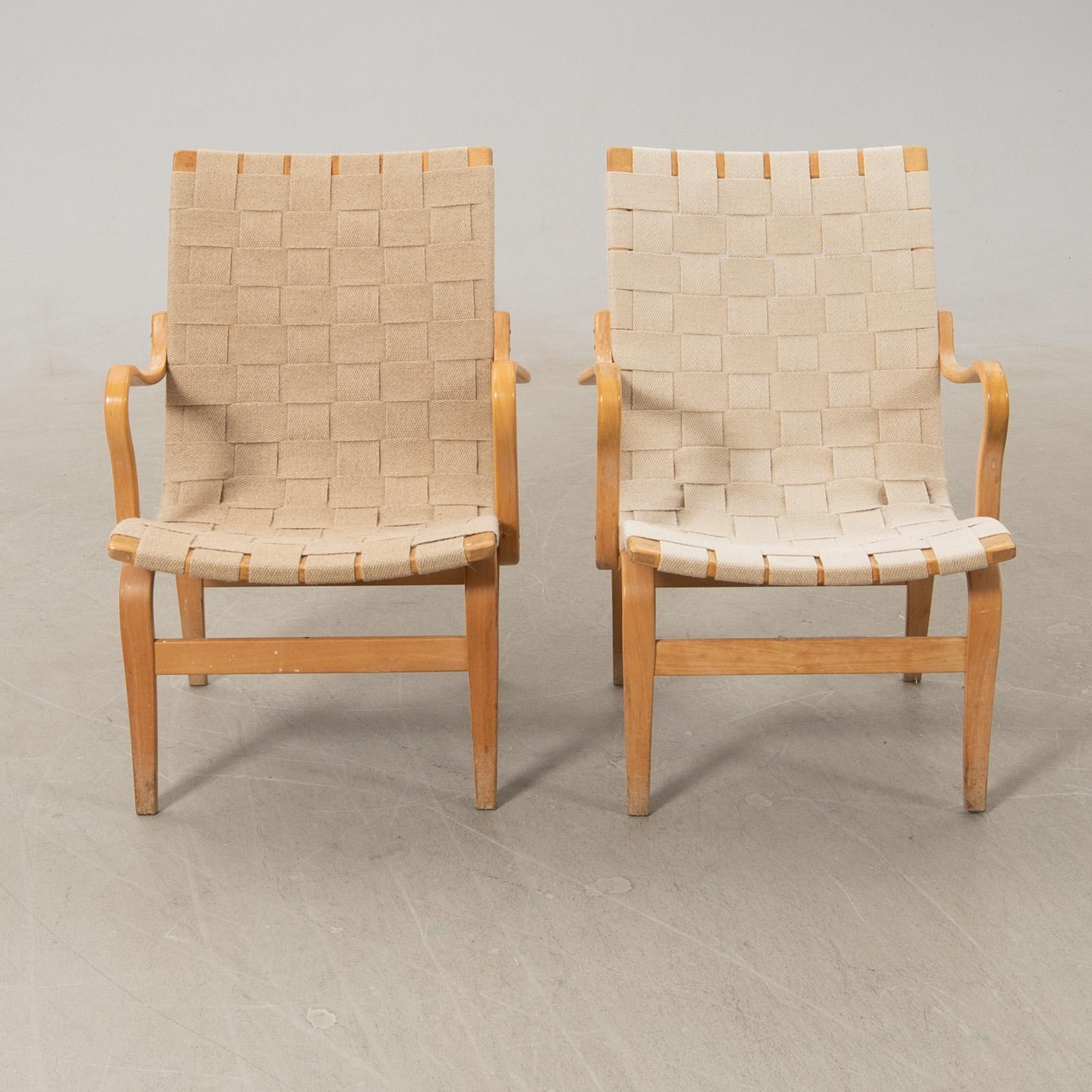 Bruno Mathsson, a pair of "Eva" armchairs, Bruno Mathsson Company, Värnamo, late 20th century.
