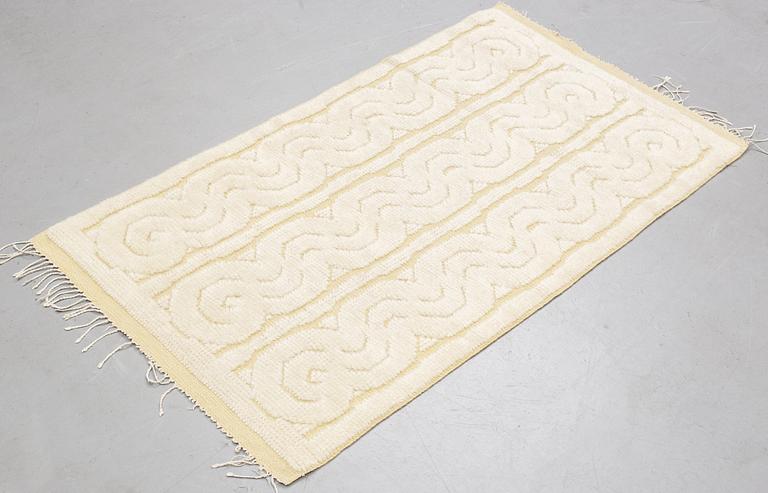 a carpet, knotted pile in relief, ca 149 x 82-83 cm, signed and dated S.K.L.H. 1947 at the back.