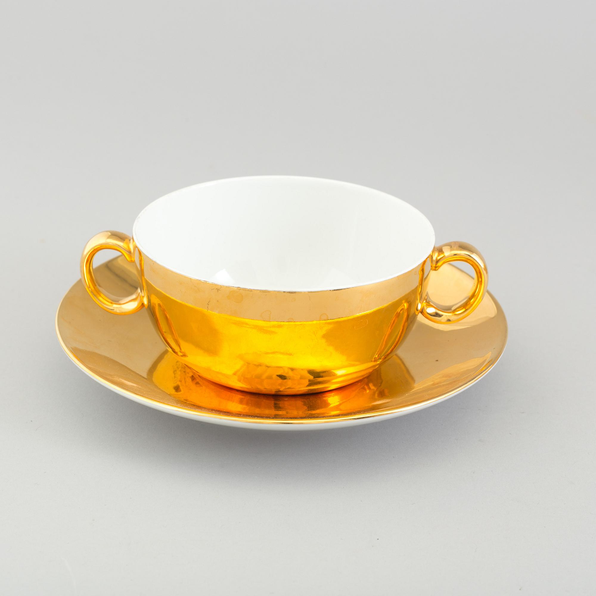 A mixed lot of thirteen pieces porcelain mostly Royal Worcester gold lustre, 20th century.