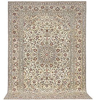 A Kashan carpet, c. 355 x 243 cm.