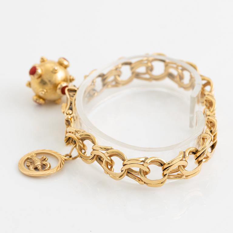 Gold charm bracelet.