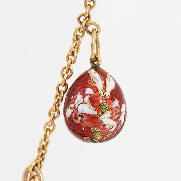 A FABERGÉ  GOLD Chain Necklace WITH 8 GOLD, ENAMEL ETC MINIATURE EASTER EGG PENDANTS, S.T PETERSBURG and 3 other.