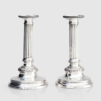 248. A Swedish pair of 18th century Gustavian silver candlesticks, marks of Petter Eneroth, Stockholm 1793.