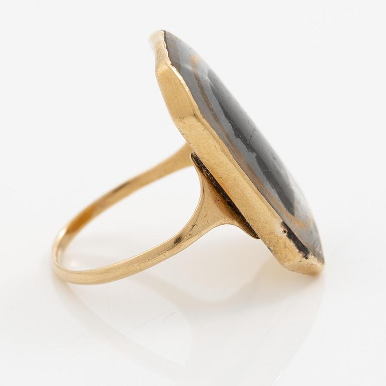 A silhouette ring, 18K gold with enamel, Friedrich Silber, Karlskrona 1796.