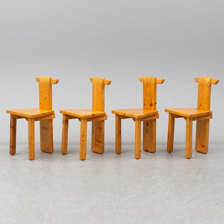 A set of four pinewood chairs, late 20th Century.