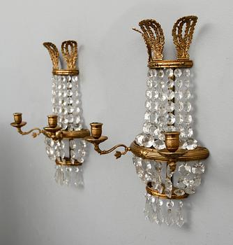 VÄGGLYSTRAR, 1 par, mässing, empirestil, 1900-talets första hälft.