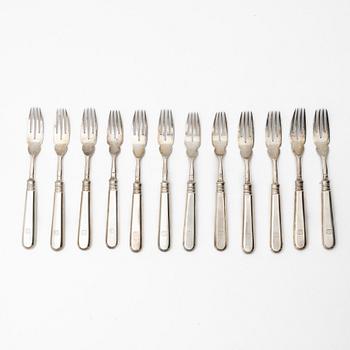 A Russian silver cutlery set, including mark of Ovchinnikov with the Imperial warrant, St Petersburg 1908-16 (24 pieces).
