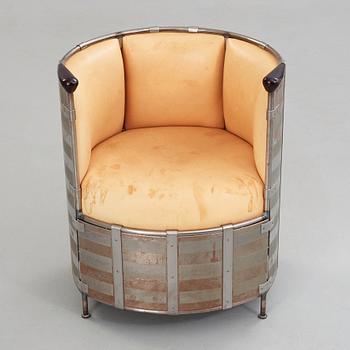 Mats Theselius, an 'Älgskinnsfåtöljen' easy chair by Källemo, Sweden, post 1991.