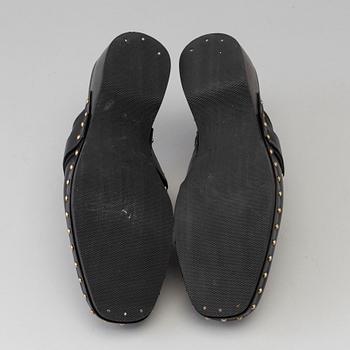 CLOGS by Gucci, size 40.