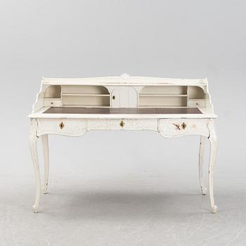 A painted rococo writing desk, mid 18th Century with later parts.