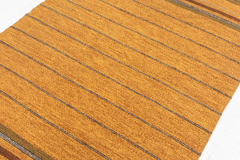 A flat weave rug, c. 200 x 125 cm.