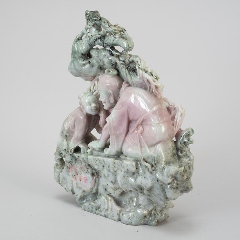 A Chinese carved sculpture, 20th century.