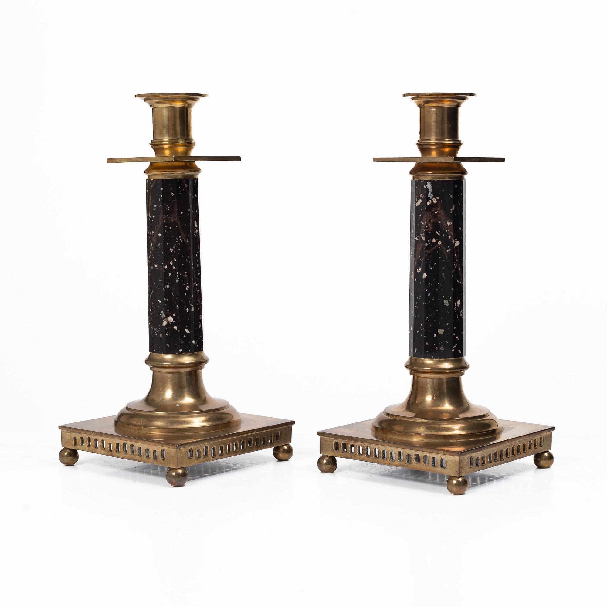 A pair of candlesticks brass and porphyry, EOS Jönköping, 20th century.