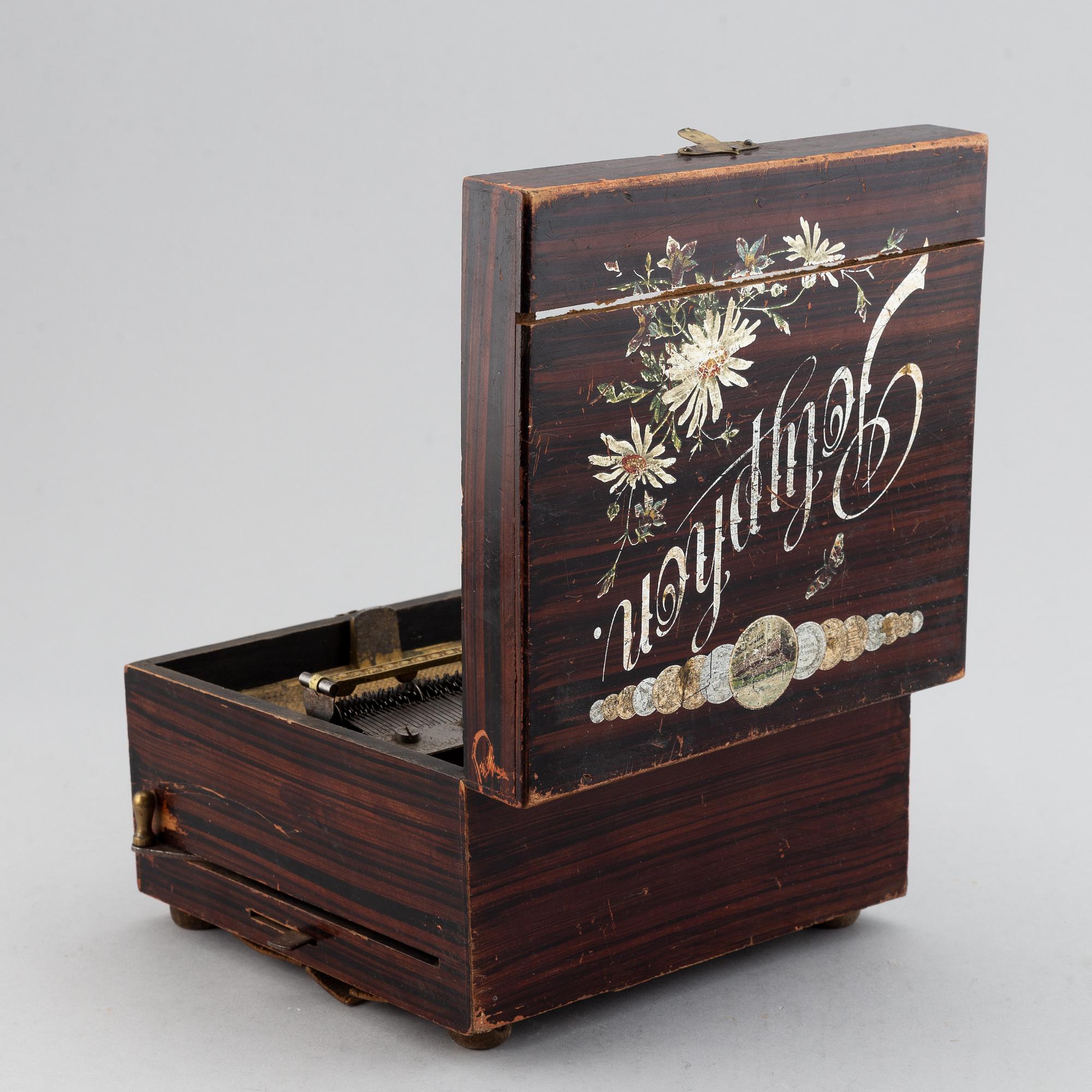 Polyphon wooden music box with ten discs, Germany, c. 1900.