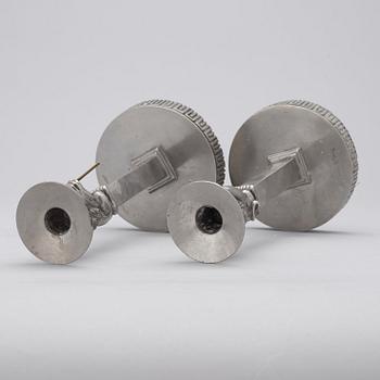 A pair of Anna Petrus pewter and brass candlesticks, Herman Bergman Konstgjuteri Stockholm ca 1923-25.