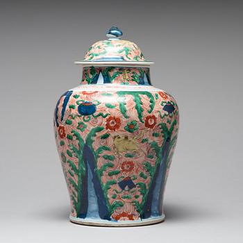 A Wucai Transitional jar with cover, 17th Century.