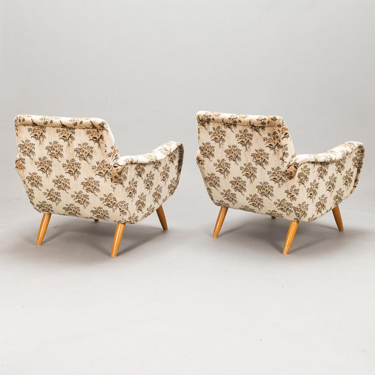 A pair of 1950s / 60s armchairs.