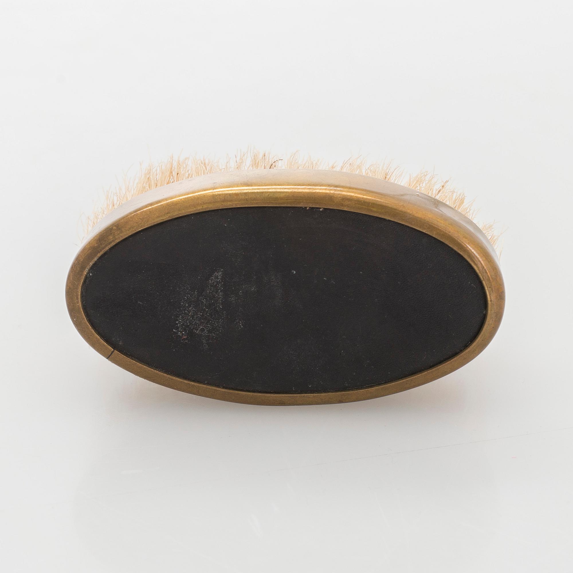Maija Heikinheimo, A 1960s hand clothes brush for Valaistustyö for Artek, Finland.