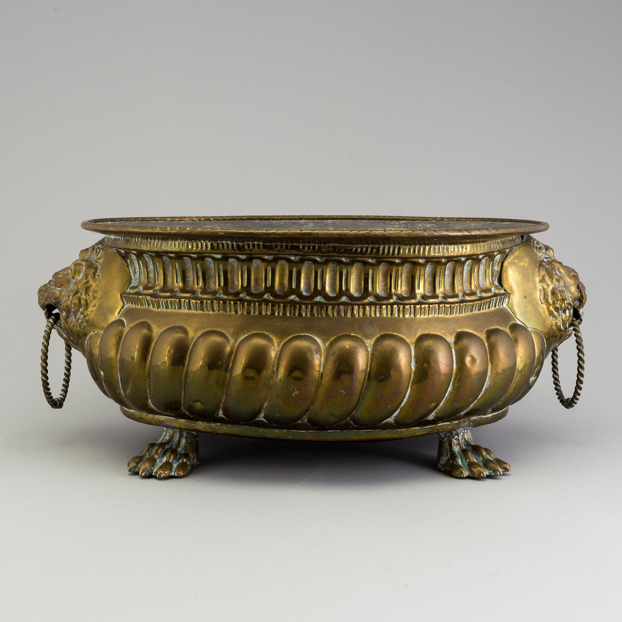 AN 18TH CENTURY BRASS JARDINIERE.