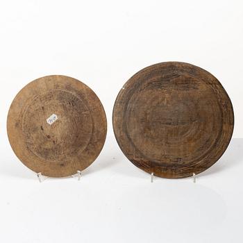 Twelve wooden plates, 19th Century.