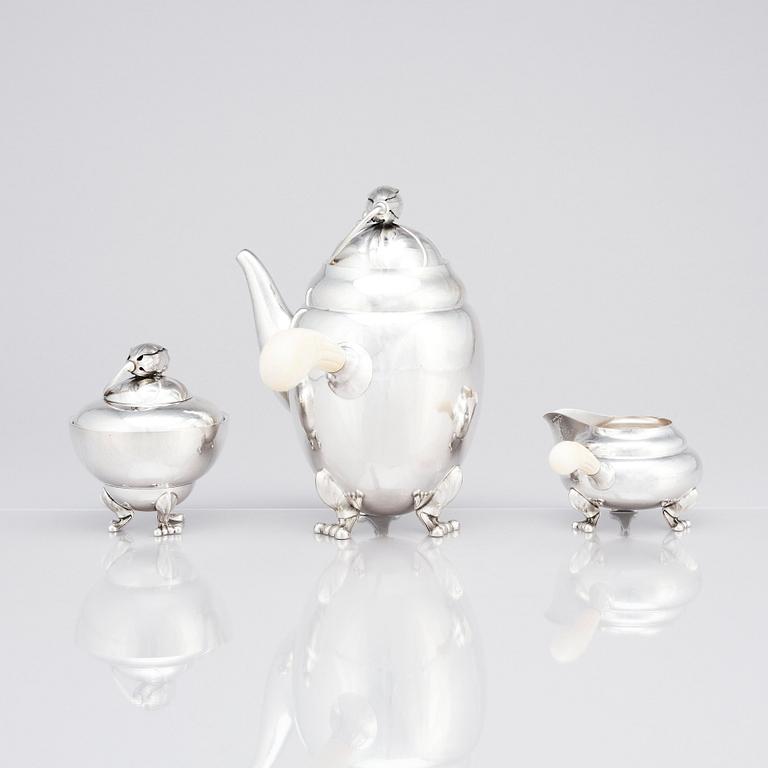 Georg Jensen, a sterling silver 3 pieces 'Blossom' coffee service, Jensen & Wendel, Copenhagen 1945-51.