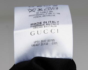 KJOL, Gucci.