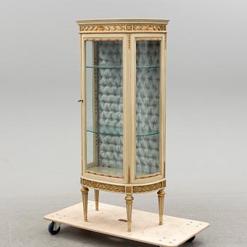 A Gustavian style display cabinet, first half of the 20th century.