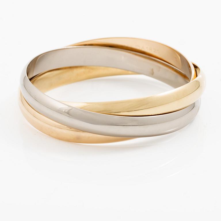 Cartier a bracelet "Trinity" 18K gold in three different colours.