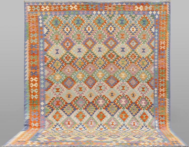 A Kilim carpet, approx. 393 x 296 cm.