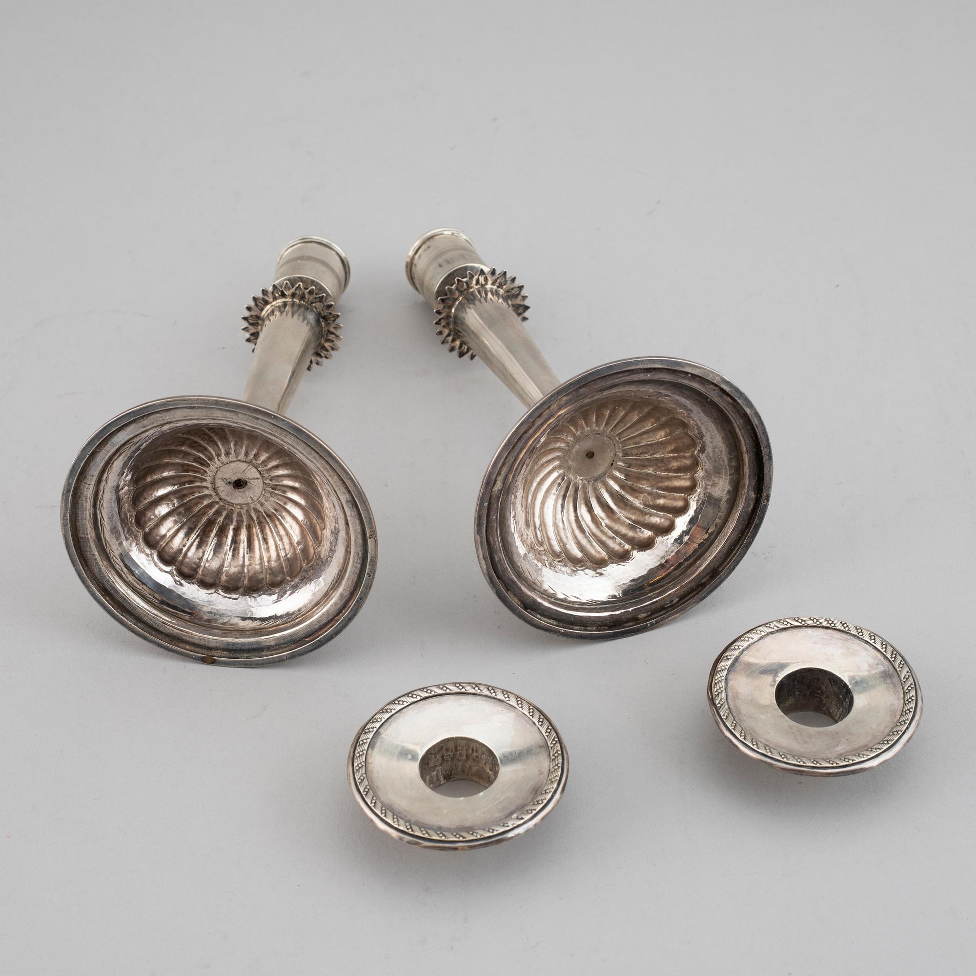 A pair of Empire silver candle sticks, 1823.