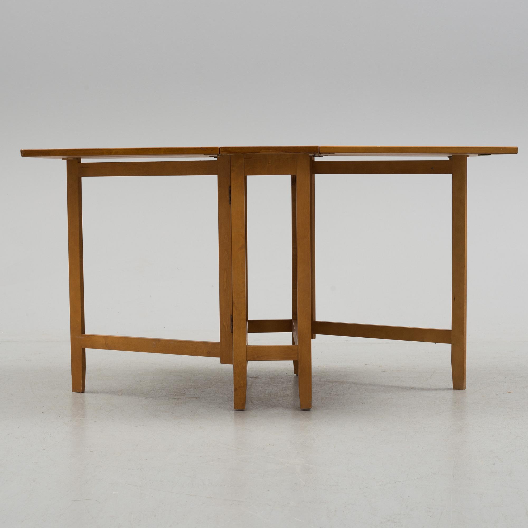 A mid 20th century flap table.