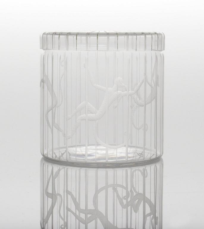 An Edward Hald engraved glass jar and cover "Apburen", Orrefors 1943.