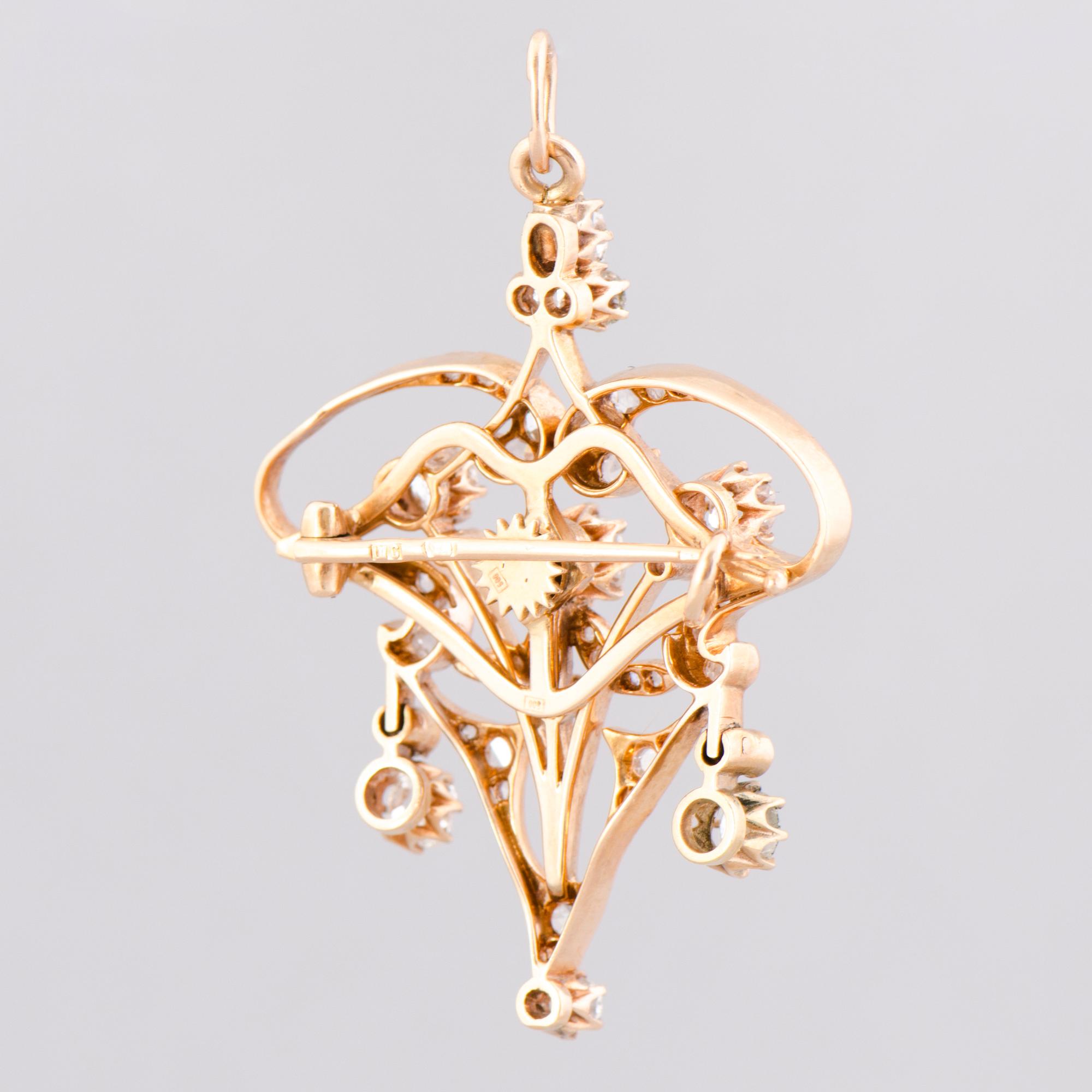 A BROOCH / PENDANT, old cut diamonds, 14K (56) gold. Russia, early 20th century.
