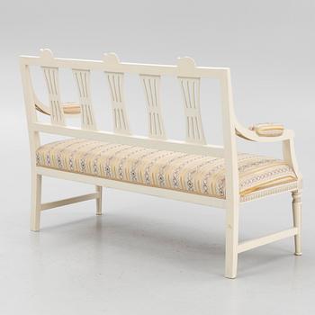 A sofa, three chairs and a table, Gustaivan style and of the Gustavian period, 19th-20th century.